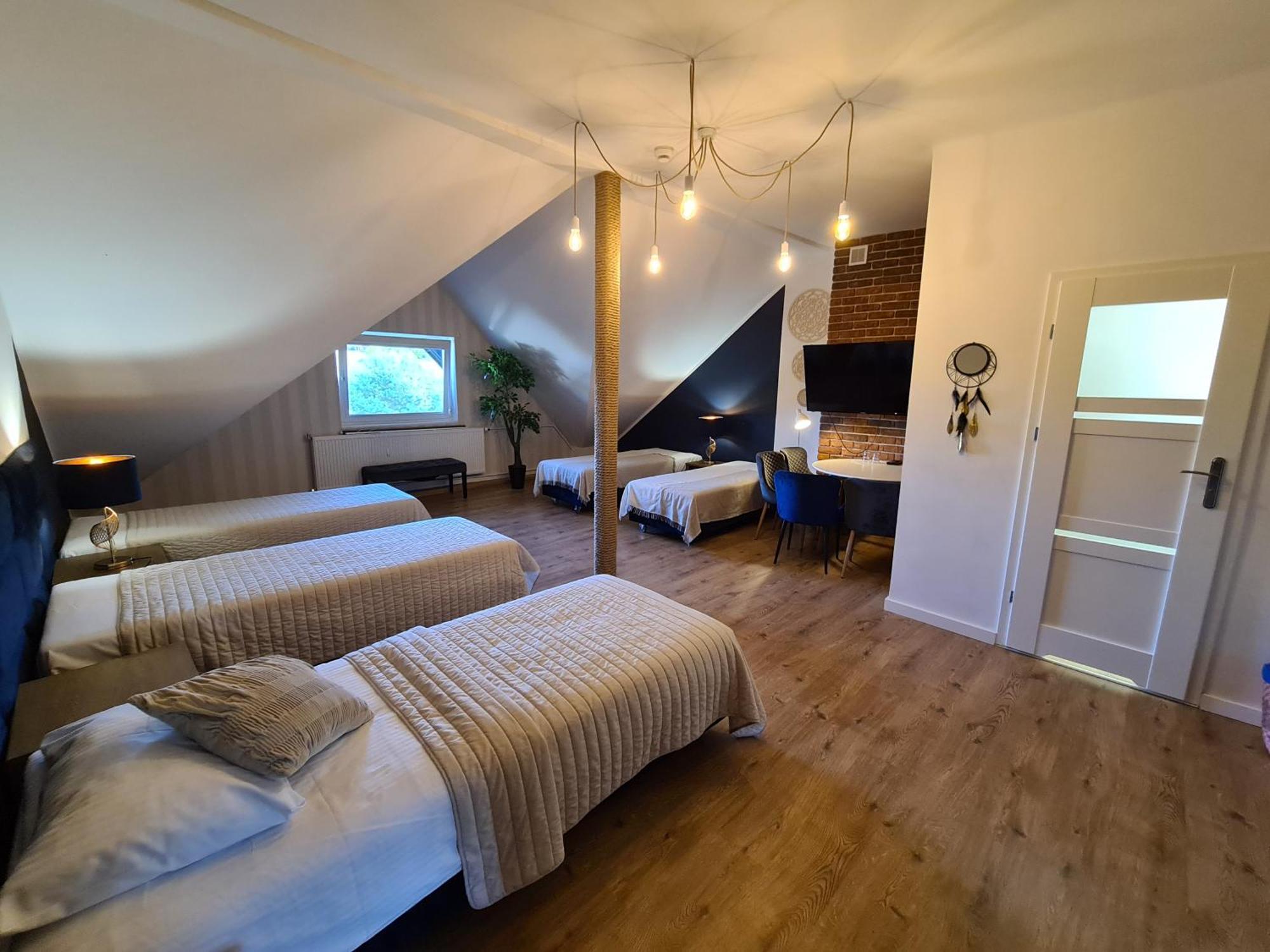 Hotel Kurpia Arte Nowogród Buitenkant foto