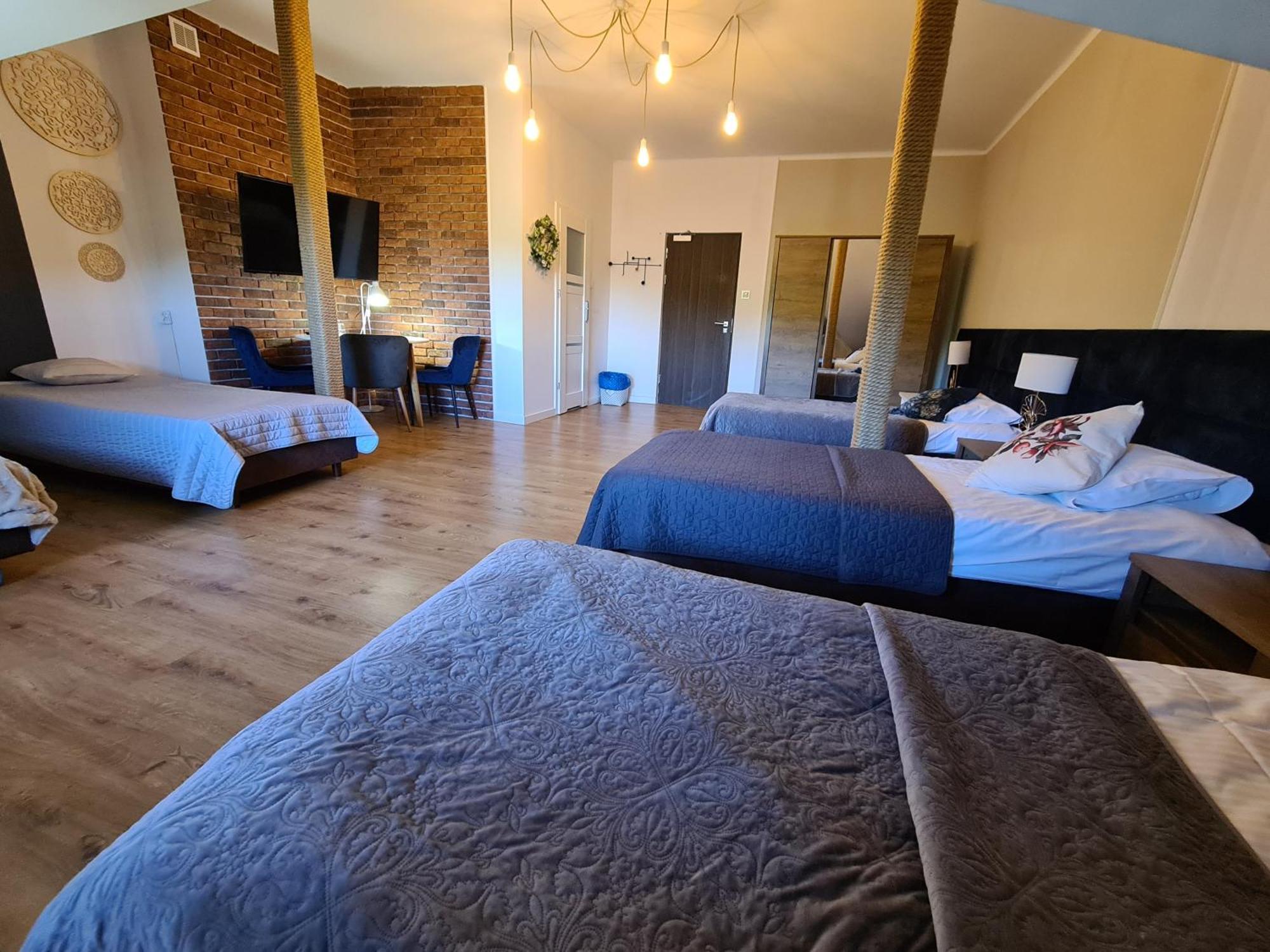 Hotel Kurpia Arte Nowogród Buitenkant foto
